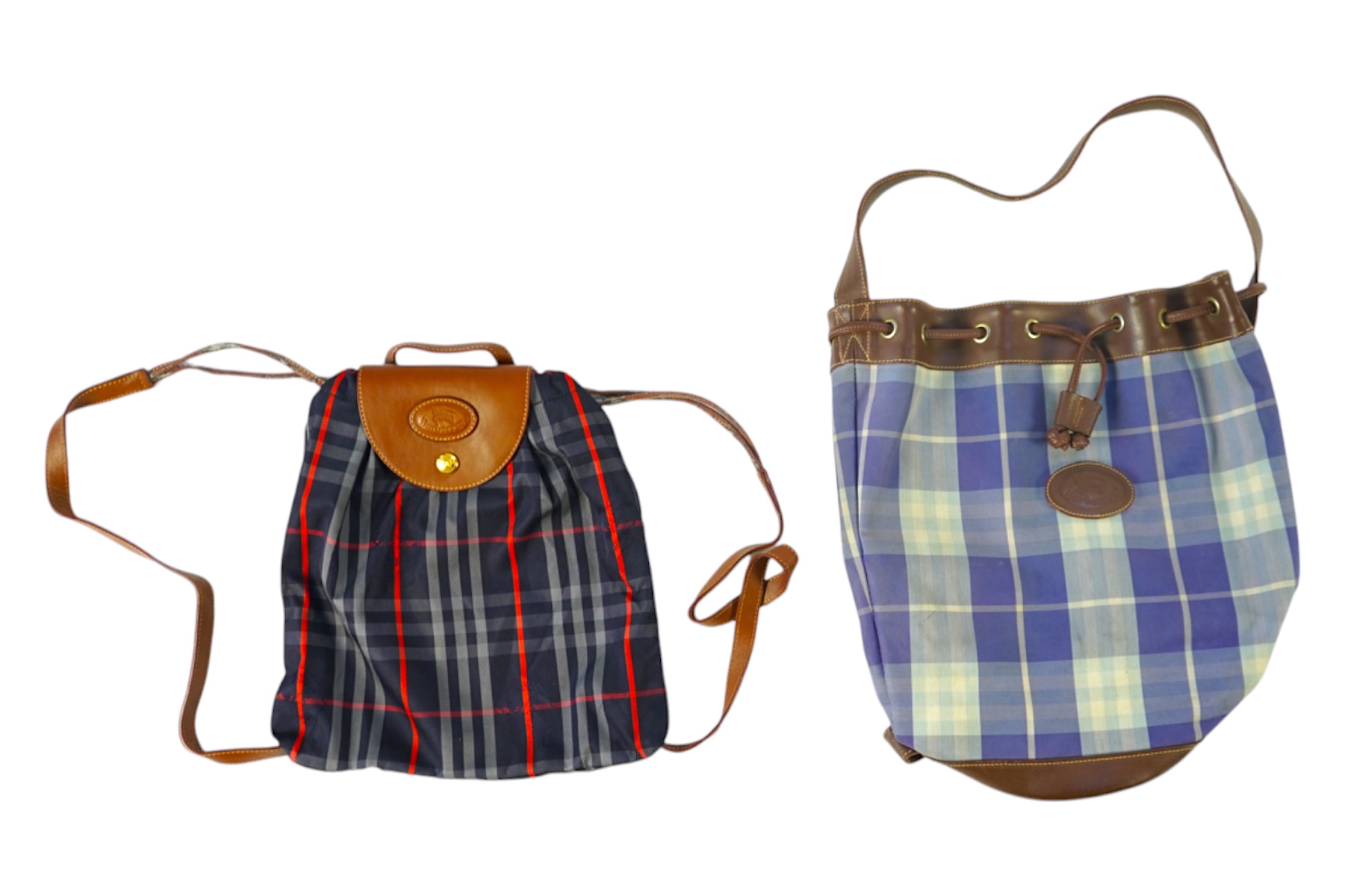 Two tartan canvas with leather trim Burberry bags, one backpack and one bucket bag